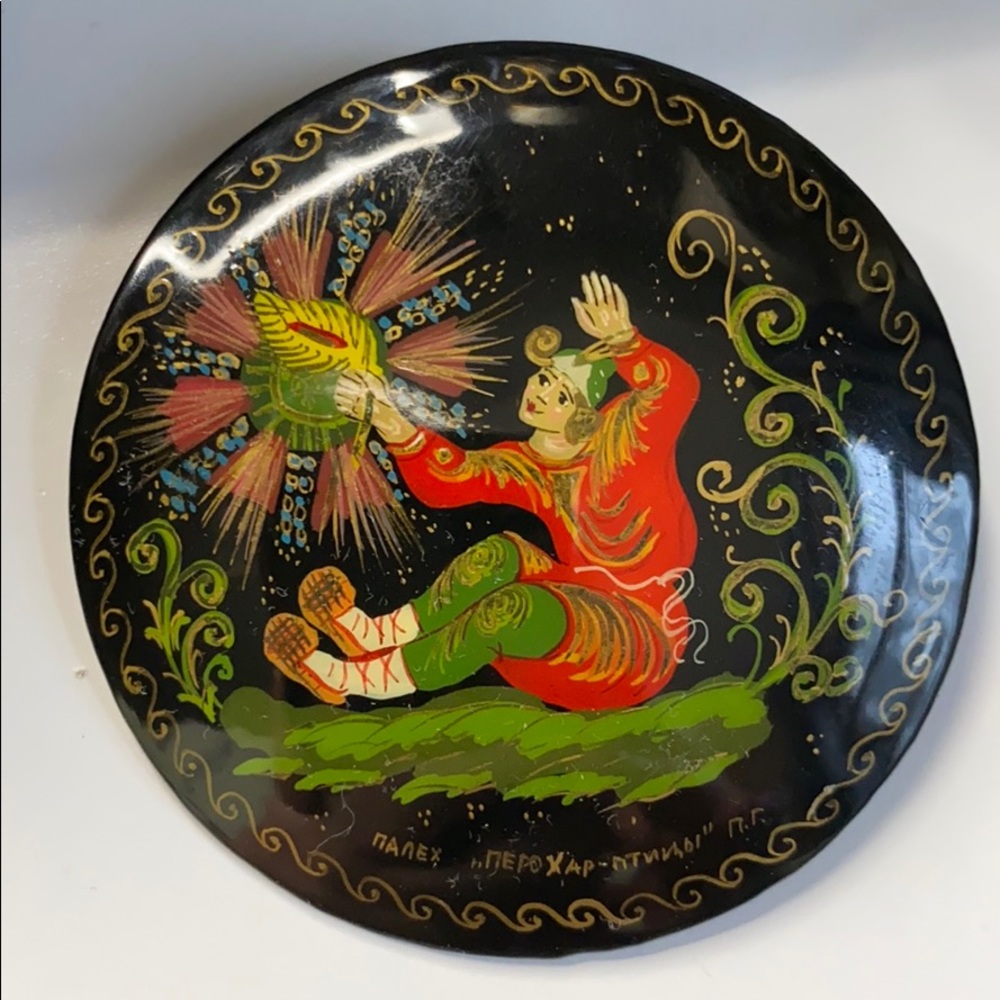 Round Russian brooch